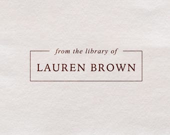 May include: A rectangular label with a black border and the text "from the library of LAUREN BROWN" in a maroon font.