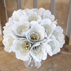 Unique wedding bridal flowers // alternative wedding bouquet // 1st anniversary gift // vintage book paper flowers // the botany of books image 1