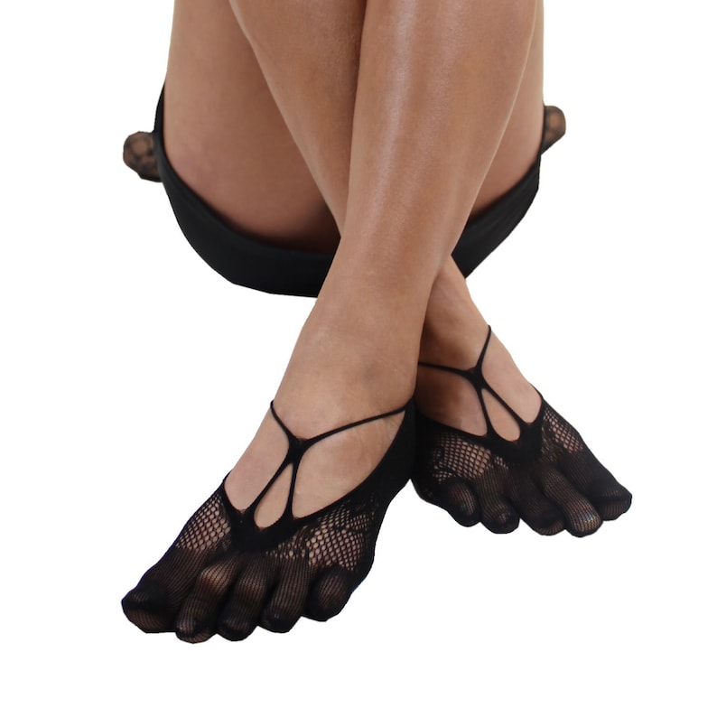 May include: A pair of black fishnet toe socks with a criss-cross design on the top of the foot.