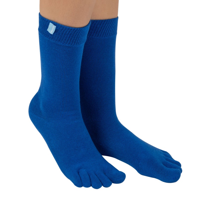 May include: A pair of blue toe socks with a light blue label on the ankle.