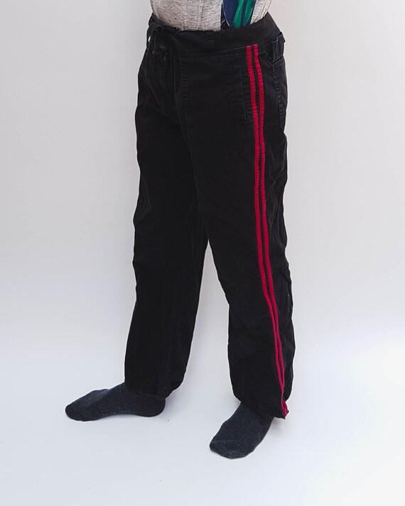 Black sweats with red stripe store