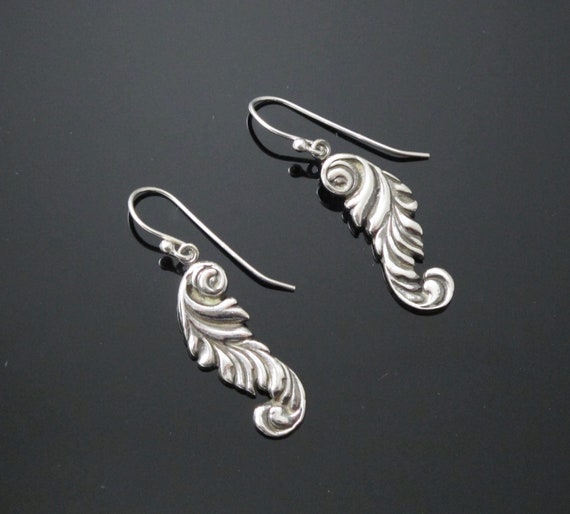 Dangle and drop earrings in sterling silver
