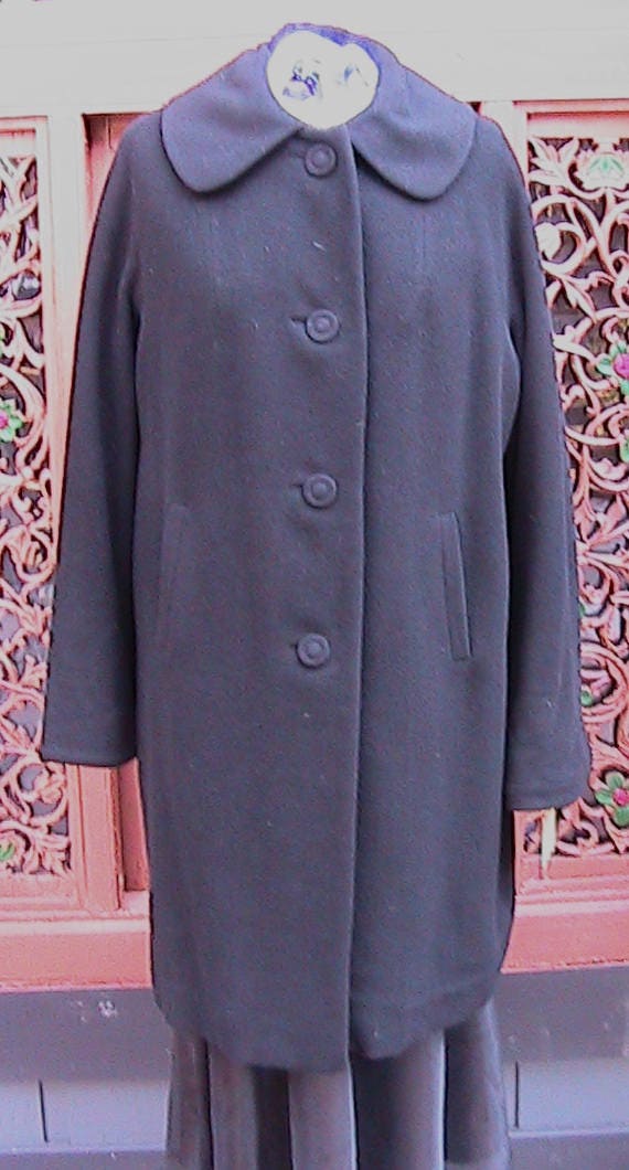 Lee Chong Tai  Black Coat