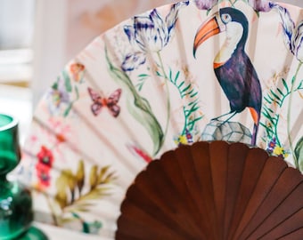 Floral Silk Fan with Toucan design and luxurious Gold tassle, part of the Mysa Collection