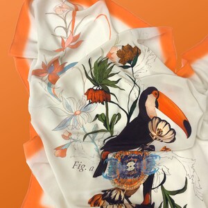 May include: A white silk scarf with an orange border and a colorful floral print featuring a toucan and the text "Fig. a".