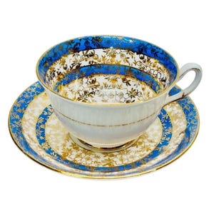 Vintage Phoenix Teacup and Saucer Blue and Gold Floral Filigree Chintz Made in England
