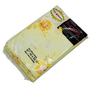 May include: A package of two yellow and white floral pillowcases, labeled "Truprest" and "Tex Made". The pillowcases are 42 inches by 32 inches.