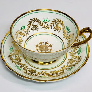 Vintage Paragon Gold Medallion Teacup and Saucer Gold Handle and Foot White Green Bone China Made in England