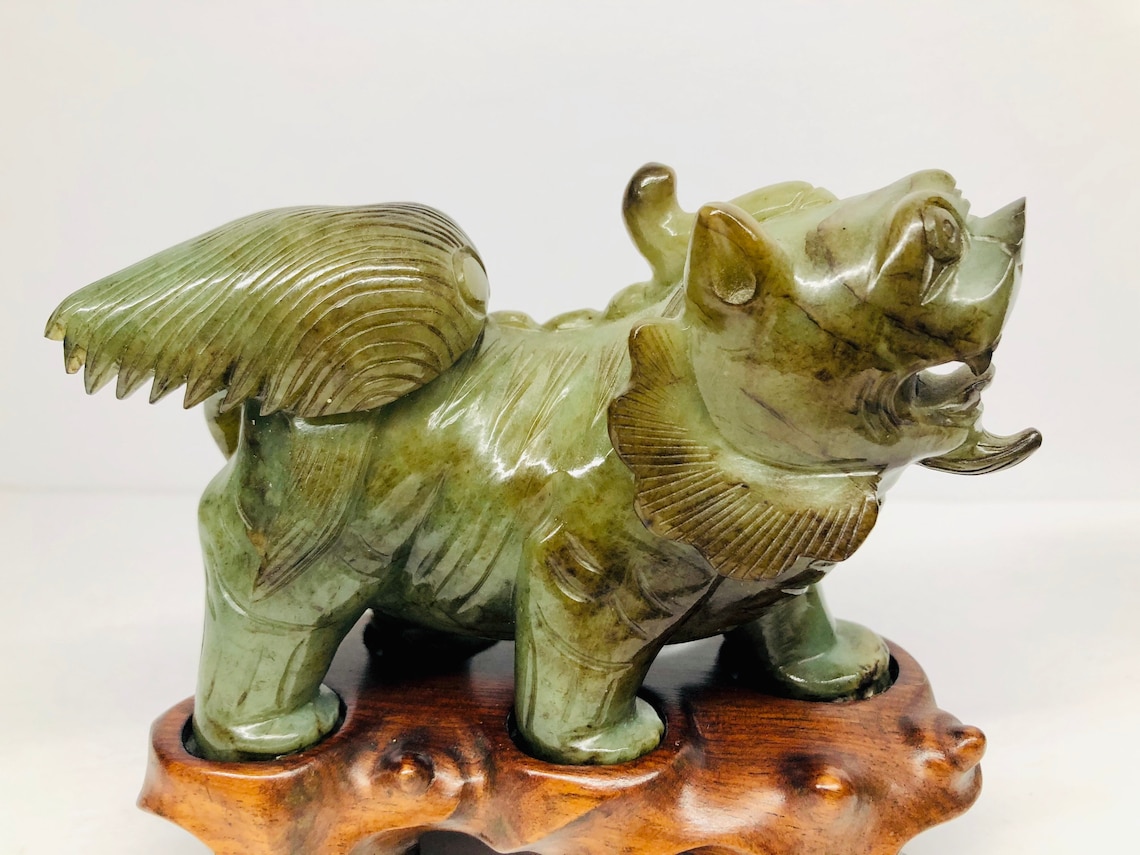 jade foo dog statues