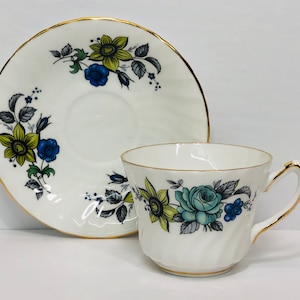 Vintage Delphine China Blue and Green Swirl Teacup and Saucer