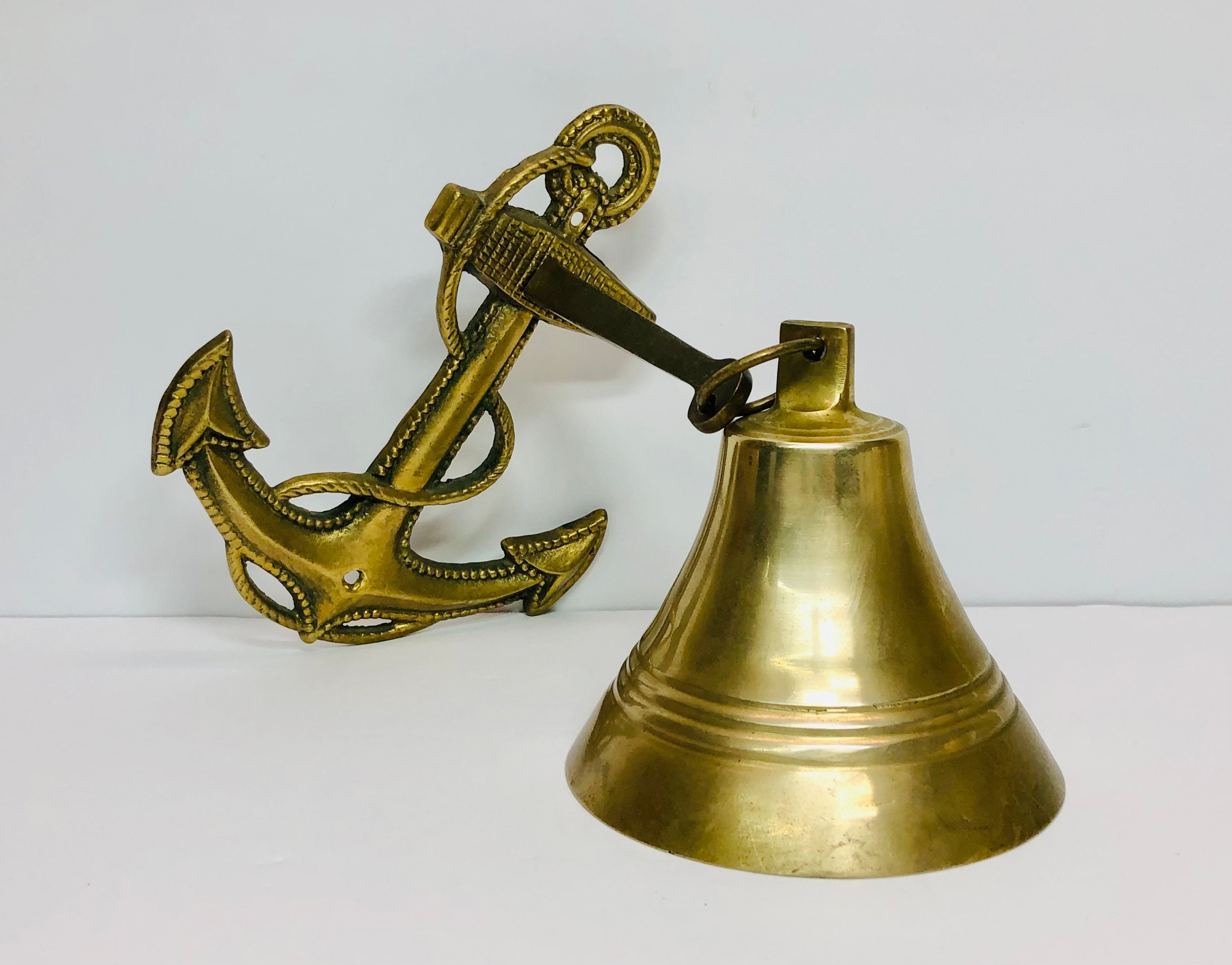 Litton Lane Brass Silver Bell Wall Decor with Anchor Backing