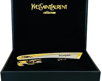 Pinza para corbata Yves Saint Laurent, oro y plata, con caja. Auténtico regalo de diseñador para él.