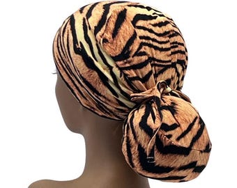 STRETCH Ponytail Scrub Cap,  Black /Orange/Yellow  Animal Print, Ava Surgical Nurse Cap