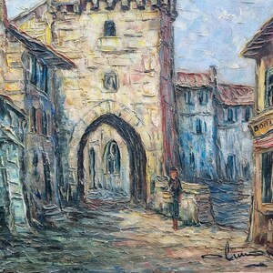 May include: A painting depicting a narrow street in a European town. The street is lined with old buildings, some of which have arched doorways. There is a small figure in the distance, and the sky is a pale blue.