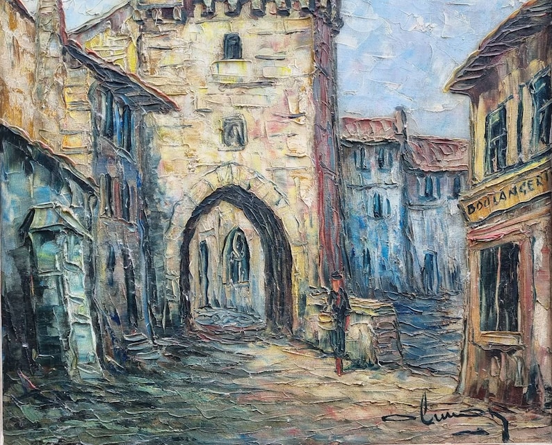 May include: A painting depicting a narrow street in a European town. The street is lined with old buildings, some of which have arched doorways. There is a small figure in the distance, and the sky is a pale blue.