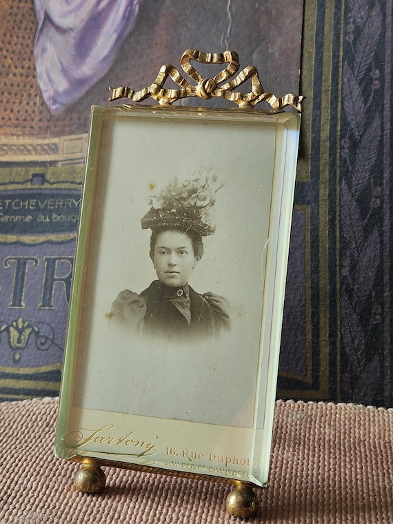 Old French glass ribbon frame.