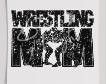May include: Black and white iron-on transfer design with the text "Wrestling Mom" and a silhouette of two wrestlers. Ready to press transfer.