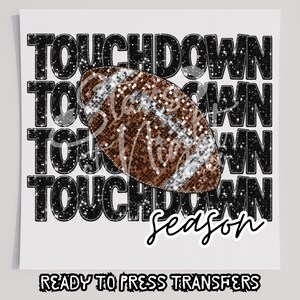May include: A brown and silver glitter football with the text "Touchdown Season" in black glitter letters. The text is repeated four times.