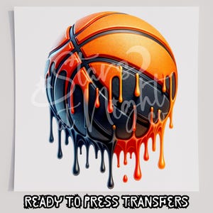 May include: A basketball with orange and black paint dripping down the sides. The basketball is on a white background. "READY TO PRESS TRANSFERS" is written at the bottom of the image.