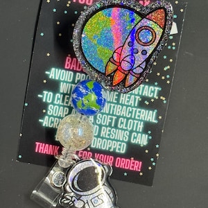 Astronaut Badge Reel, Glitter Space Rocket, Handmade Resin Swivel Clip image 1