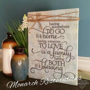 Wooden sign with scripture, Having somewhere to go is home, having someone to love is a family, having both is a blessing, religious sign
