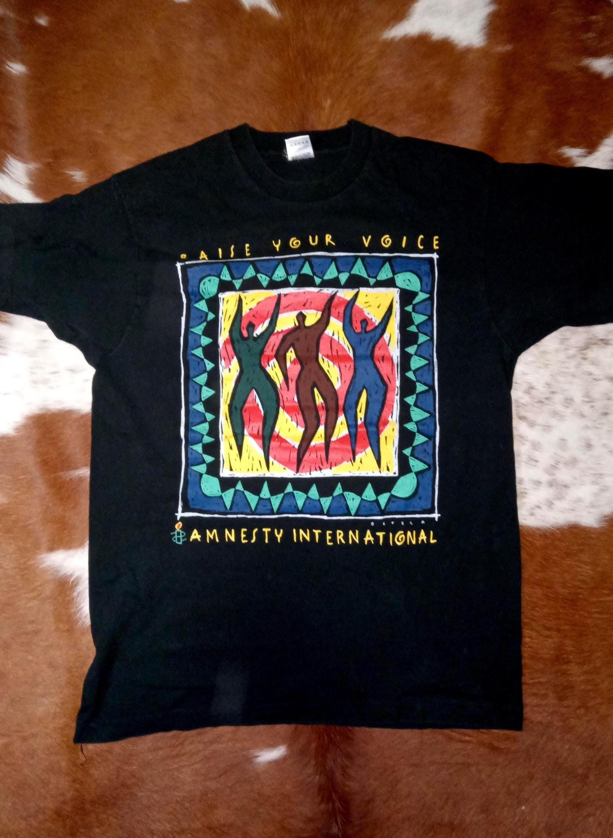 トップス 90s amnesty international tee noroll Vintage Amnesty International Shirt - Etsy