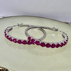 Lab Ruby Hoop Earrings Rhodium Sterling Silver 1.24"L x 0.12"W.