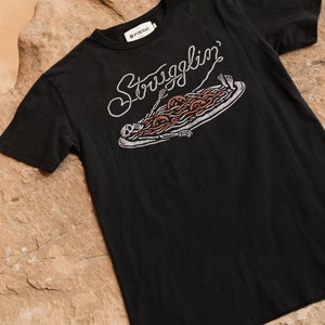 Camiseta Lutando