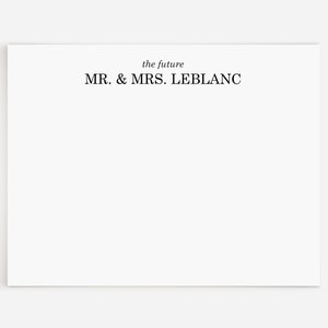 May include: A white card with the text "the future" and "MR. & MRS. LEBLANC" printed in black.