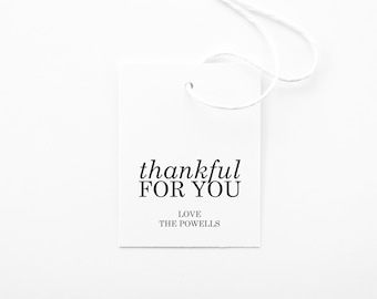 May include: White gift tag with black text that reads "thankful for you" and "Love, The Powells".