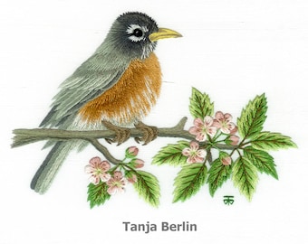 May include: Embroidered artwork of a robin perched on a branch with pink blossoms. The robin is gray and brown with a yellow beak. The artwork is signed "Tanja Berlin".