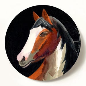 May include: A circular painting featuring a horse head in profile against a solid black background. The horse has a brown coat, a prominent white blaze on its face, and a dark mane. The artist's signature is visible in white on the right side.