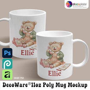 May include: White 11oz ceramic mug featuring a cartoon bear with a pink phone, a dress, and the name "Ellie". The bear is sitting next to a pink rotary phone and a notepad with crayons. The mug is a DecoWare® Poly Mug Mockup.