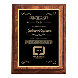 May include: A wooden plaque with a gold border and a black background. The plaque has a certificate of appreciation design with the text "CERTIFICATE OF APPRECIATION" and "PROUDLY PRESENTED TO Jeferson Benjamin". The plaque also has a gold logo of a speech bubble with three dots and the text "YOUR LOGO SLOGAN HERE".