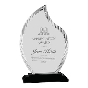 May include: A clear glass award in the shape of a flame with a black base. The award has the text "YOUR LOGO", "APPRECIATION AWARD", "Joan Harris", "Psalm 24:2", "A small token of our deep love and appreciation. The time spent, the life invested in the future generations will someday give bountiful fruit. Thank you. 4-5-2022" engraved on it.