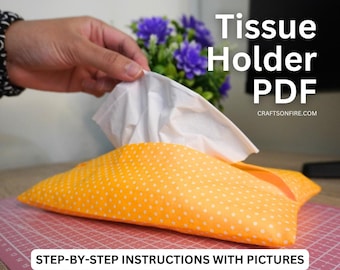 May include: A yellow polka dot tissue holder with a white tissue box inside. The holder is made of fabric and has a flap to pull out the tissues. The text "Tissue Holder PDF" and "CRAFTSONFIRE.COM" is visible at the top of the image. The text "STEP-BY-STEP INSTRUCTIONS WITH PICTURES" is visible at the bottom of the image.