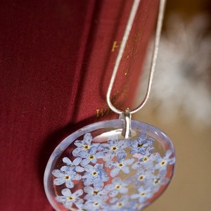 Delicate resin pendant with blue forget me nots image 3
