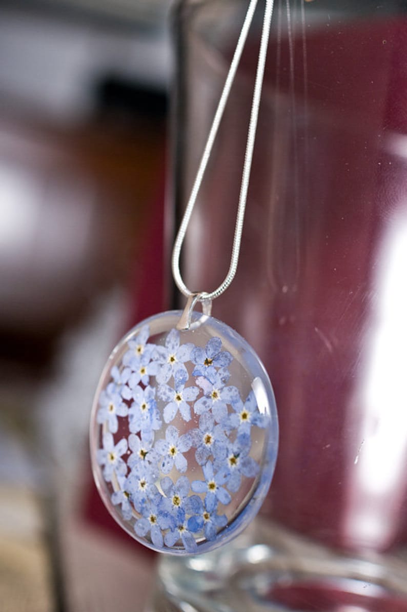 Delicate resin pendant with blue forget me nots image 2