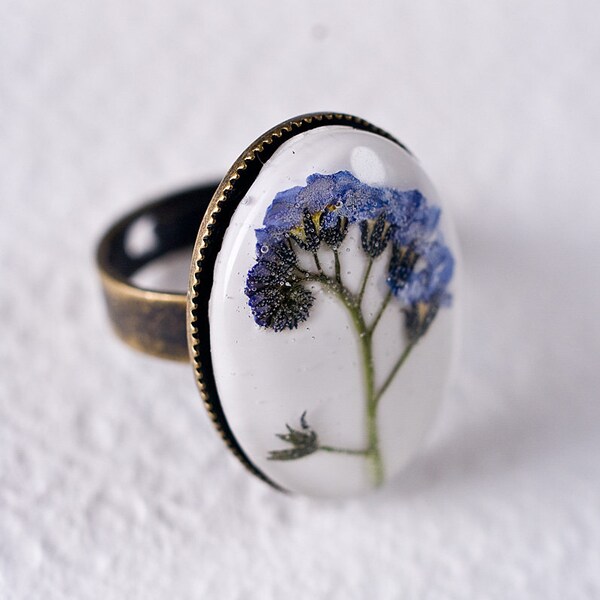 Delicate resin ring with forget me not flowers