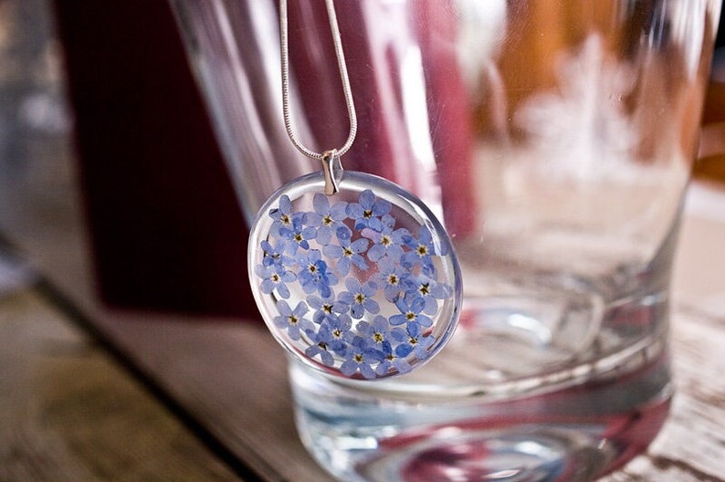 Delicate resin pendant with blue forget me nots image 1
