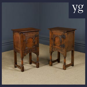 May include: A pair of antique wooden bedside cabinets. Each cabinet features a small door with decorative carvings and stands on four legs. The cabinets are made of dark wood and are a classic piece of furniture. The cabinets are a classic piece of furniture.
