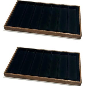 May include: Two rectangular wooden display trays, each featuring a dark brown wood frame and a black velvet-lined interior. Each tray is divided into seven long, narrow, vertical compartments designed for organizing items in a neat, orderly fashion.