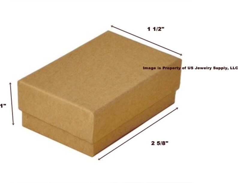 May include: A brown cardboard box with dimensions of 1 inch by 1 1/2 inches by 2 5/8 inches. The box is ideal for packaging small items.