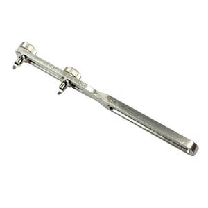 May include: A silver watch case opener tool with two adjustable knobs. The tool is designed to open and close watch cases.