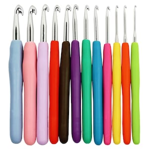 May include: Set of 12 colorful crochet hooks with metal tips. The hooks are made of plastic and have a comfortable grip. The hooks are arranged in a row from left to right, with the smallest hook on the left and the largest hook on the right.