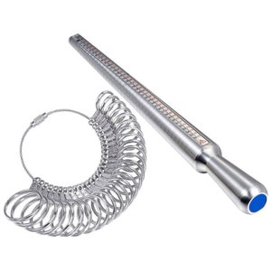 May include: A silver ring sizer set with a ring sizing stick and a set of metal ring sizer loops. The ring sizer stick has measurements in inches and millimeters. The stick has a blue end.