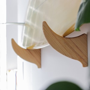 Wooden surfboard store wall rack