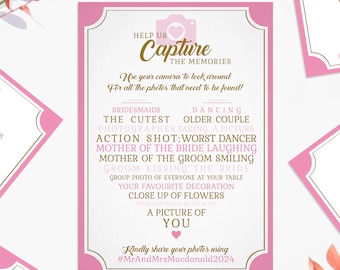 May include: Pink and gold wedding photo booth sign with the text "Help us Capture the Memories" and a list of photo ideas, including "Bridemaids", "Dancing", "The Cutest Older Couple", "Photographer Taking a Picture", "Action Shot: Worst Dancer", "Mother of the Bride Laughing", "Mother of the Groom Smiling", "Groom Kissing the Bride", "Group Photo of Everyone at Your Table", "Your Favorite Decoration", "Close Up of Flowers", "Drunkest Person in the Room", "A Picture of You". The sign also includes the hashtag "#MrAndMrsMacdonald2024".