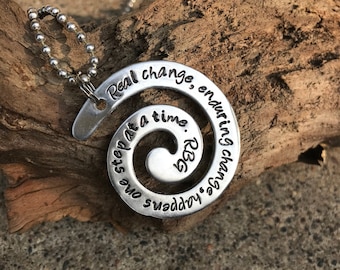 RBG Quote Pendant | Swirl | 1.5" | "Real Change, Enduring Change, Happens One Step At a Time" |