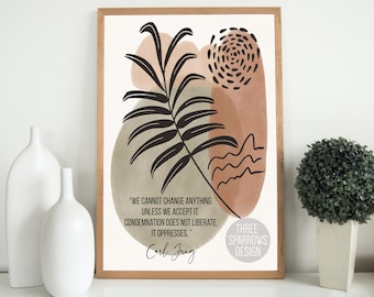 May include: A printable art print with a quote by Carl Jung: "We cannot change anything unless we accept it. Condemnation does not liberate, it oppresses." The quote is surrounded by abstract shapes in shades of brown and peach, with a black leaf design.